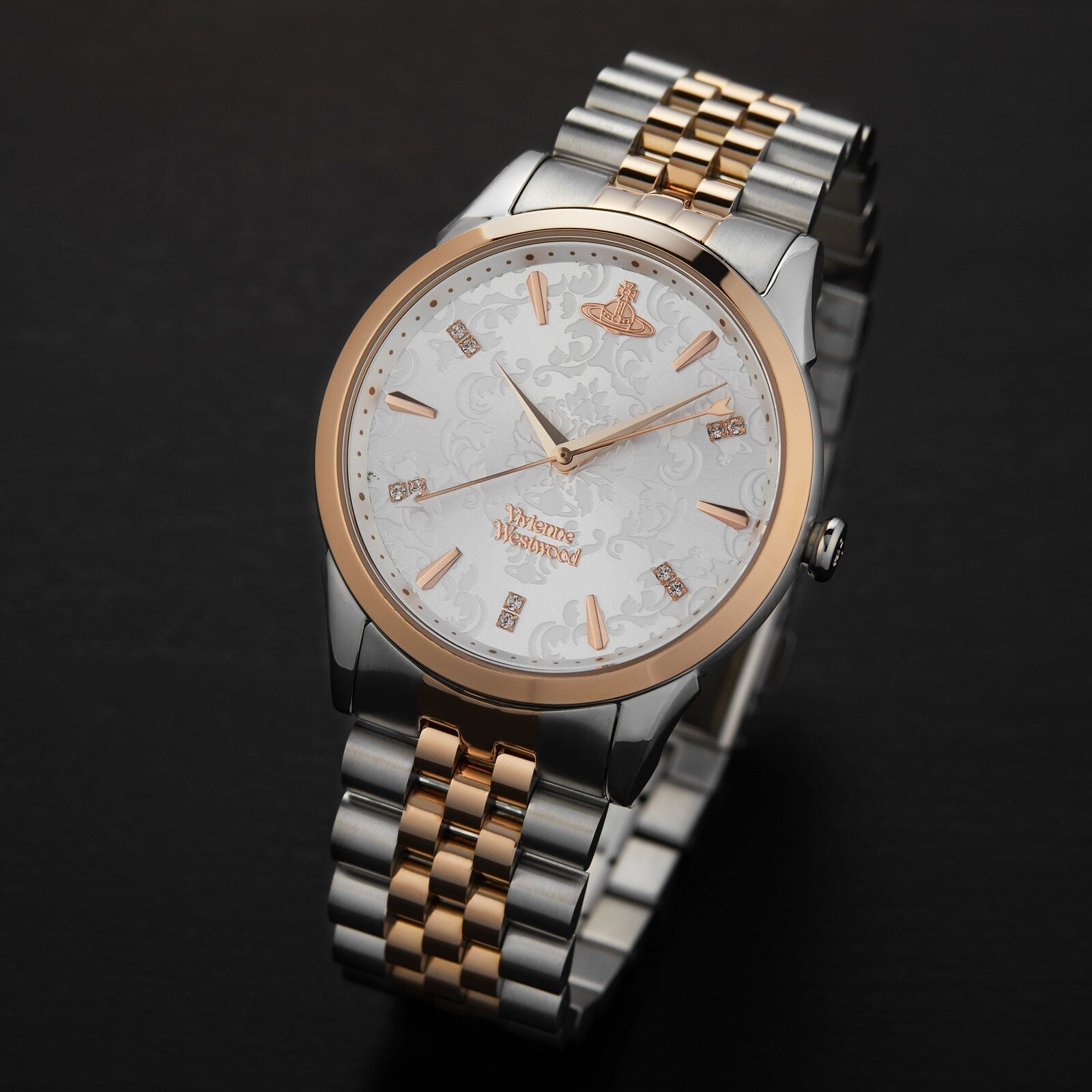 Vivienne Westwood Wallace women's watch with a silver dial and two tone stainless steel bracelet. Shown at an angle.