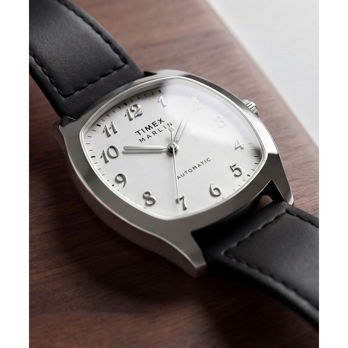 Exhibition case back of the Timex Marlin Tonneau TW2Y84300 with its black leather strap