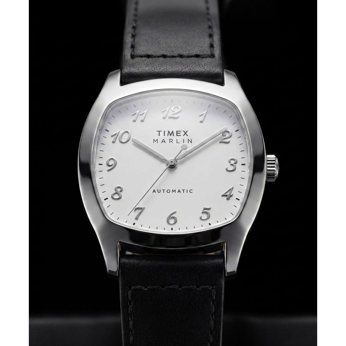 Close-up of the Timex Marlin Tonneau TW2Y84300 white dial and polished silver-tone case