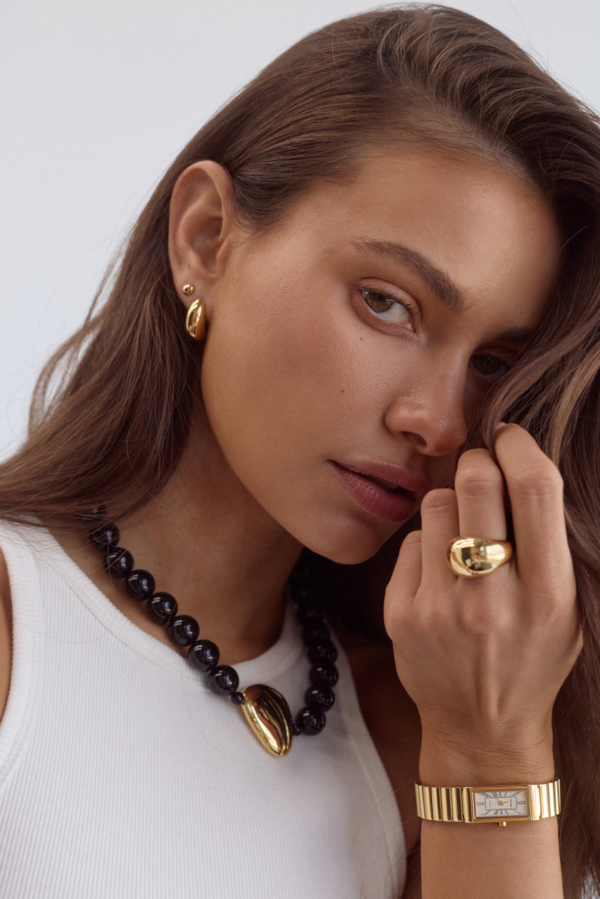 Cendré Enna 18K gold-plated earrings studio shot