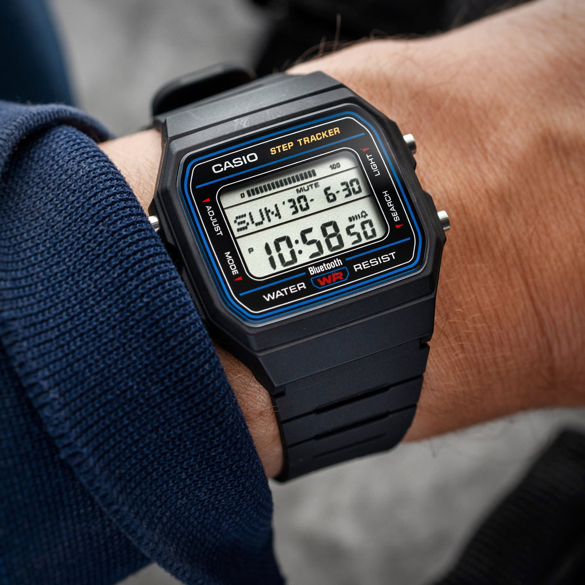 Casio FB100W-1A black resin digital watch shown worn on the wrist