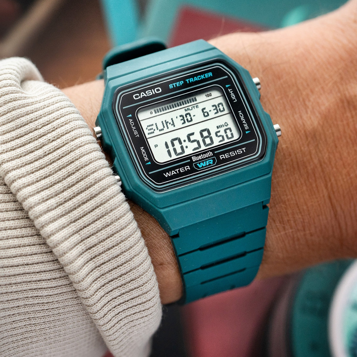 Casio FB100W-3A green resin digital watch shown worn on the wrist