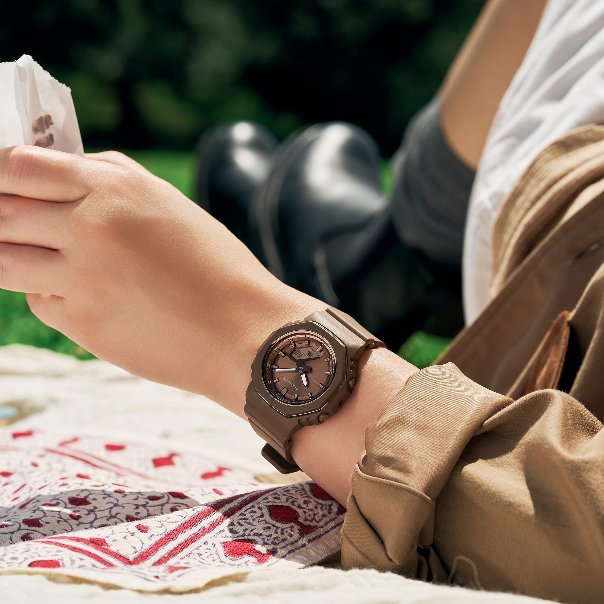 G-Shock GMAP2110B-5A brown resin watch worn on the wrist