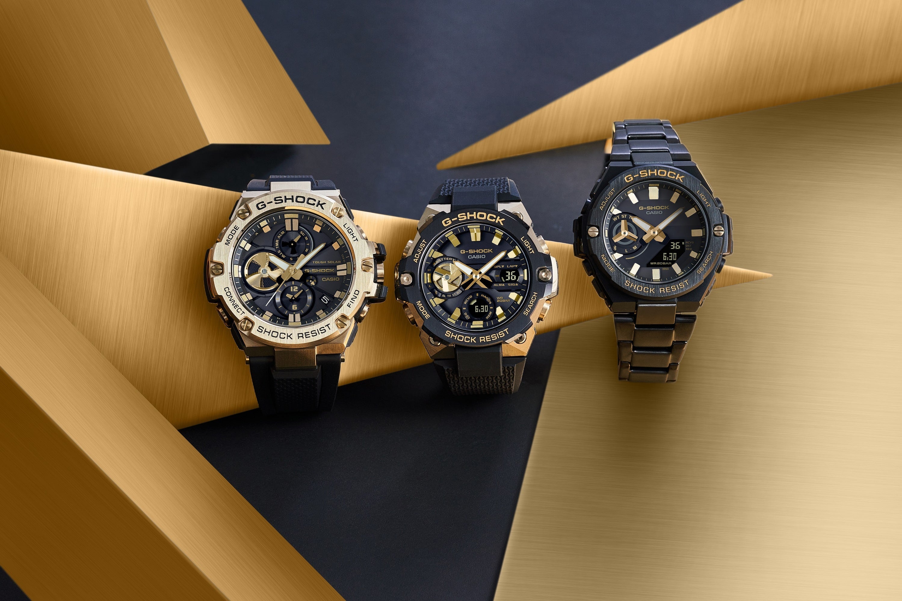 Three luxury wristwatches with dark faces and metallic accents displayed together.