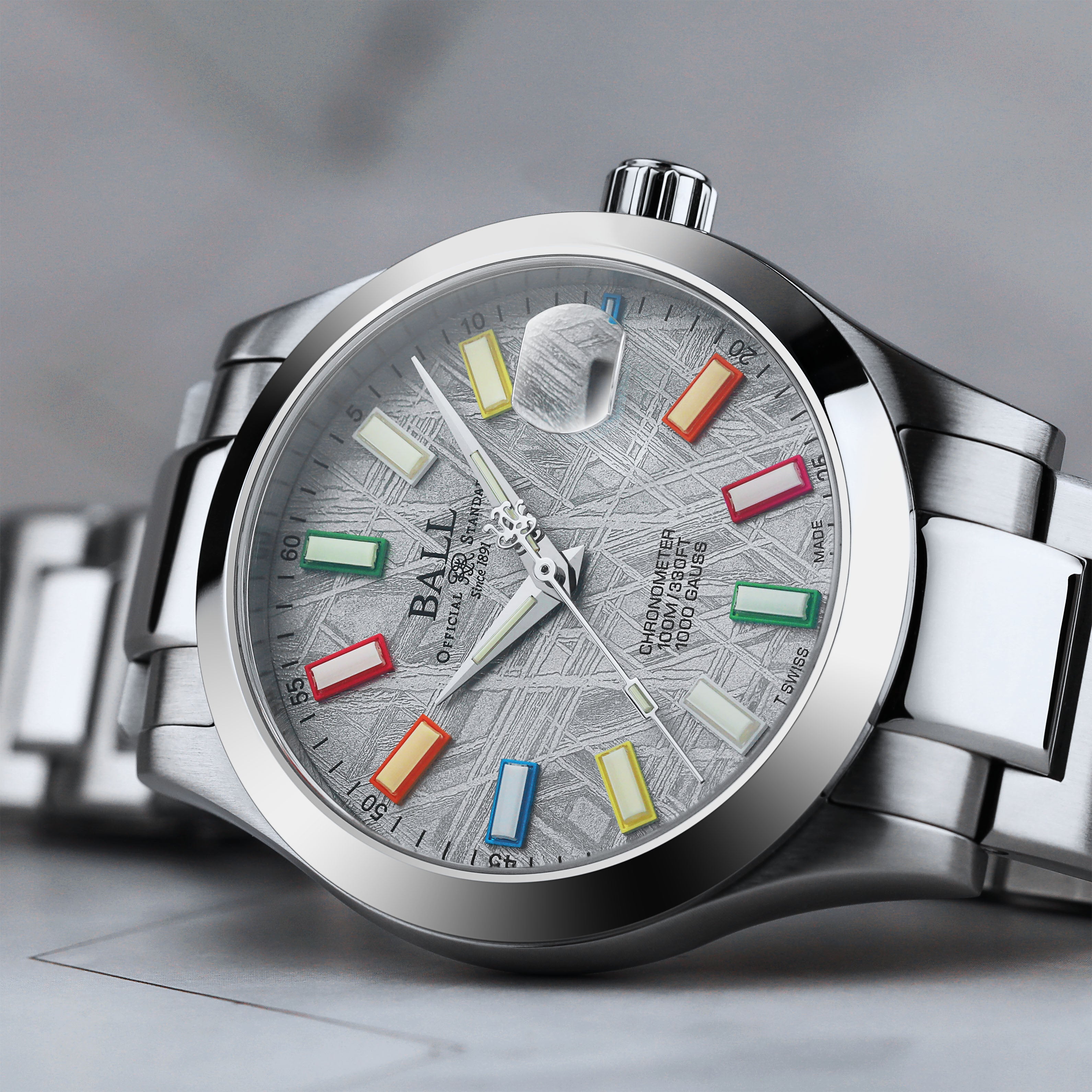 Side view of Ball Engineer III Marvelight Chronometer Meteorite watch with silver stainless steel band and meteorite dial.