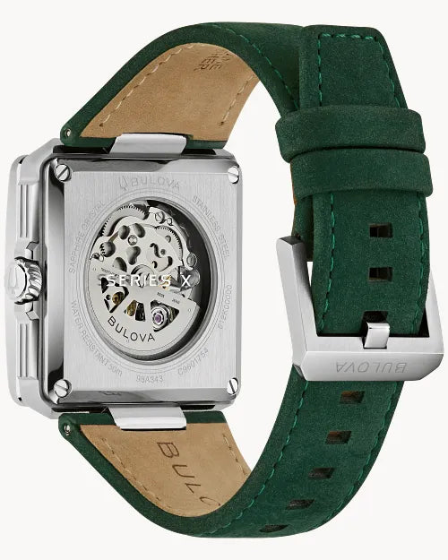 Bulova Series X 98A343 automatic men's watch with hunter green skeleton dial, green bezel insert and green suede strap — detail view
