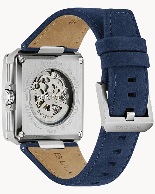 Bulova Series X 98A342 automatic men's watch with slate blue skeleton dial, blue bezel insert and blue suede strap — detail view