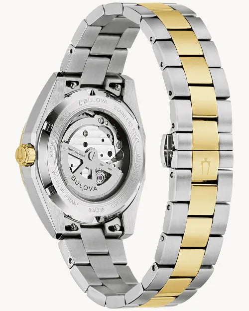 Bulova Surveyor 98A338 automatic men's watch with green open-heart dial and two-tone stainless steel bracelet — detail view