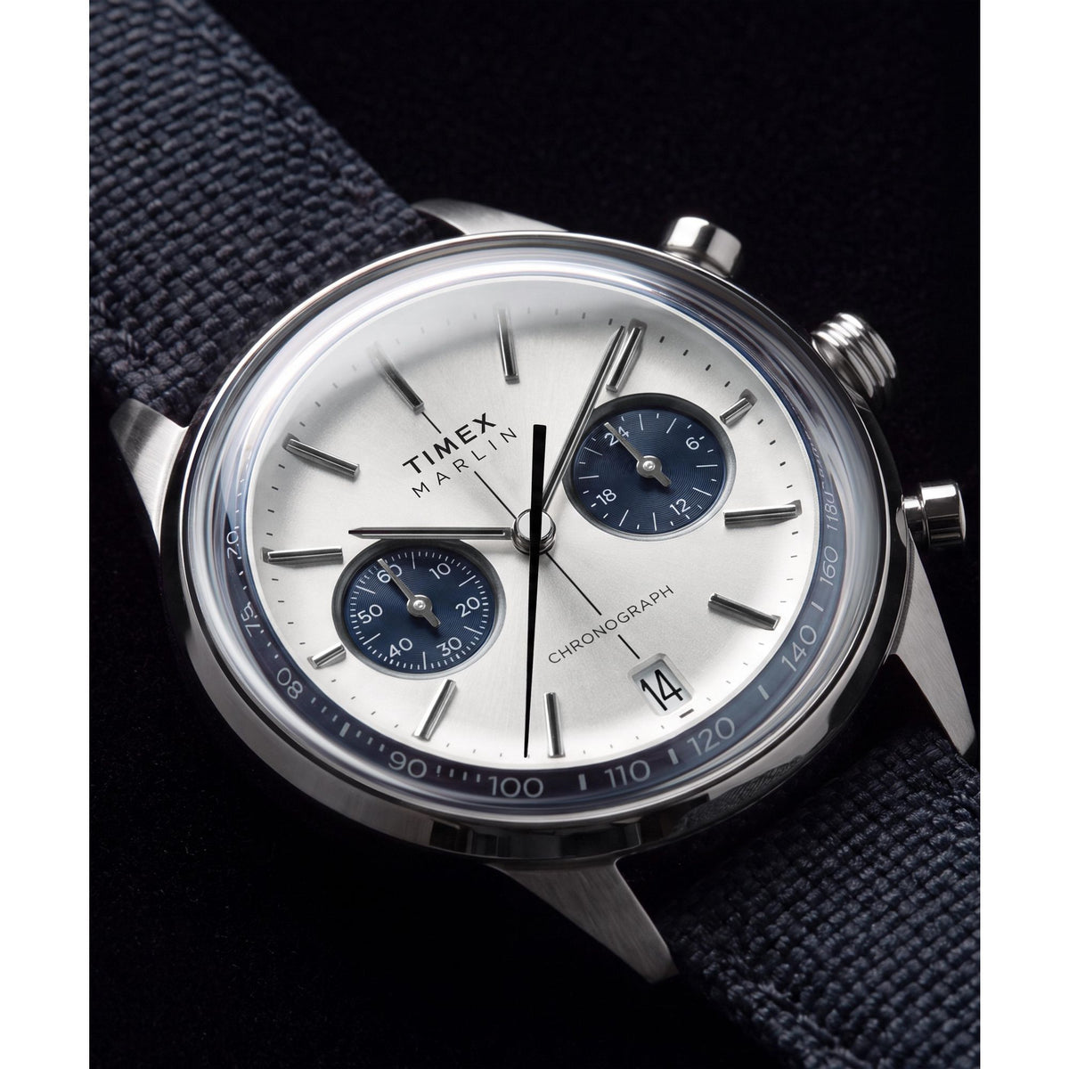 Timex Marlin Jet Chronograph TW2Y89900 silver sunray dial on a navy woven strap, dial close-up