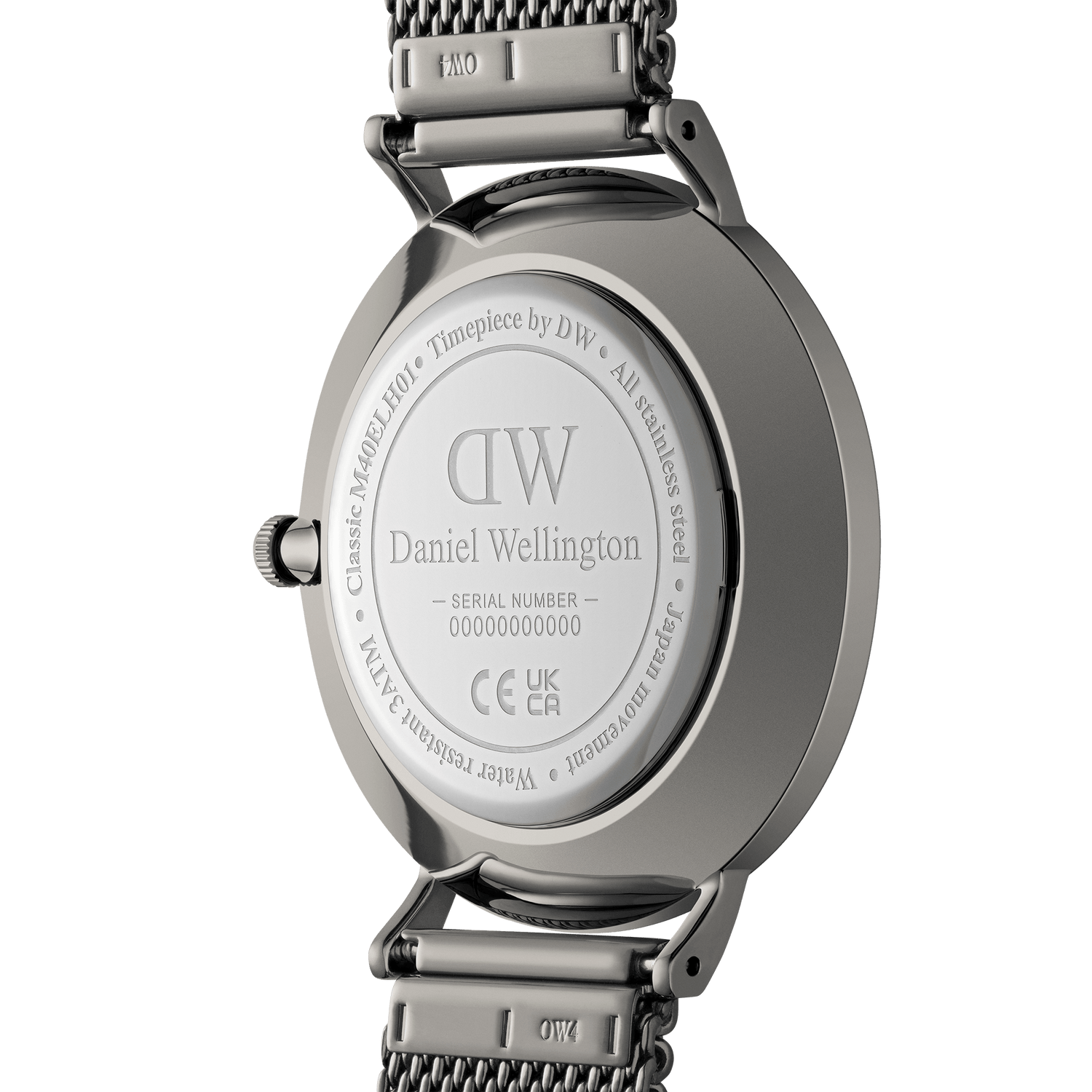 Back of a Daniel Wellington wristwatch with engraved details on its metal casing.