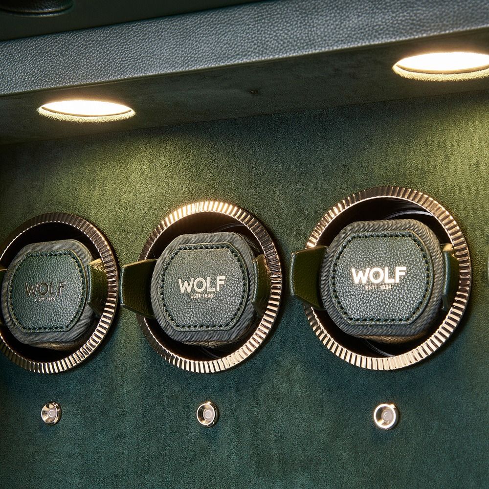 WOLF Athos 8 Piece Watch Winder Safe in Green, close-up of the lit watch winder modules