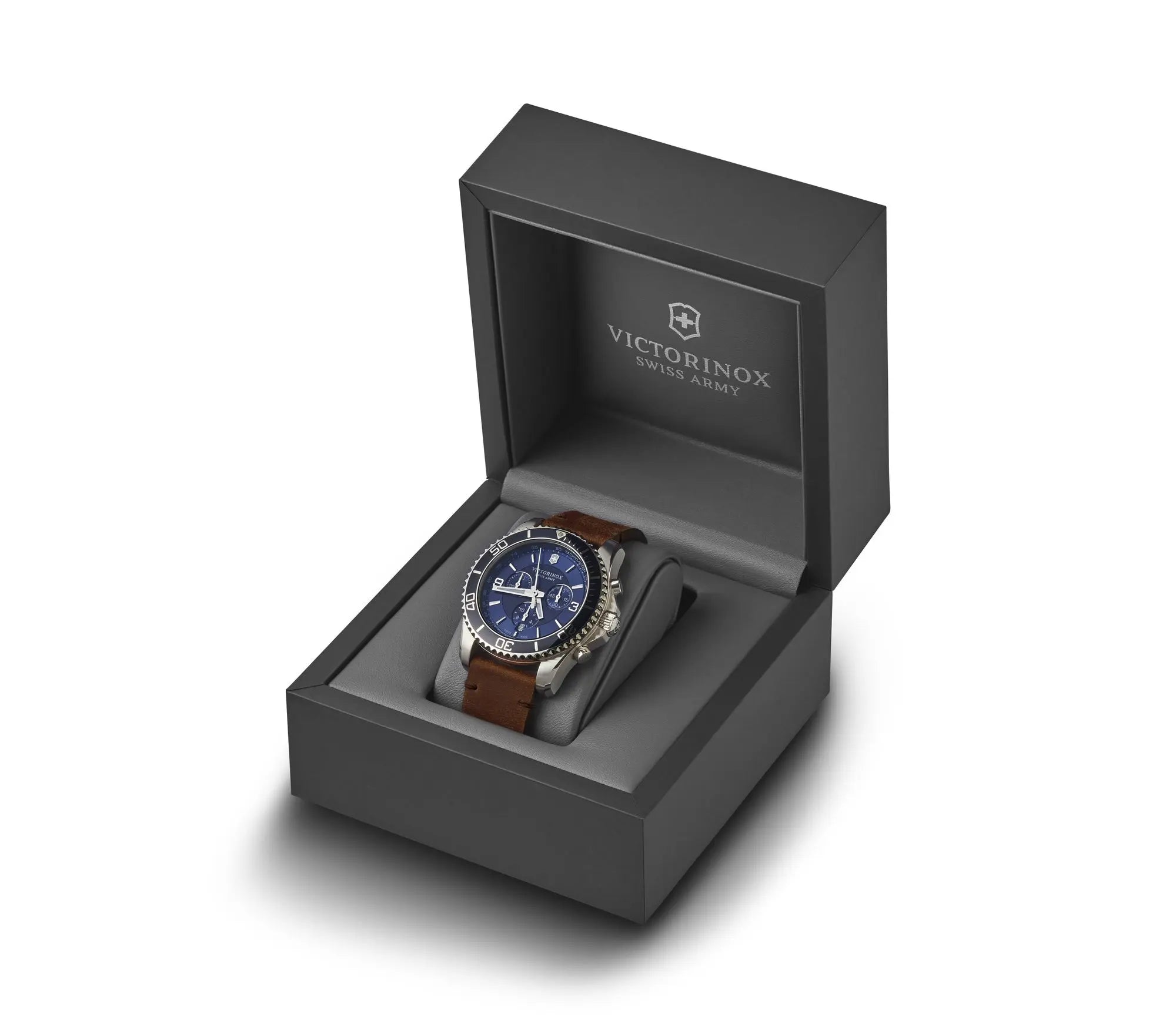 Victorinox wristwatch with a blue dial and brown leather strap displayed in an open presentation box.
