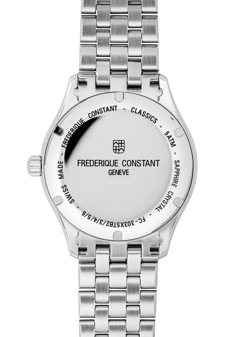 Back of a Frederique Constant wristwatch with a stainless steel bracelet.