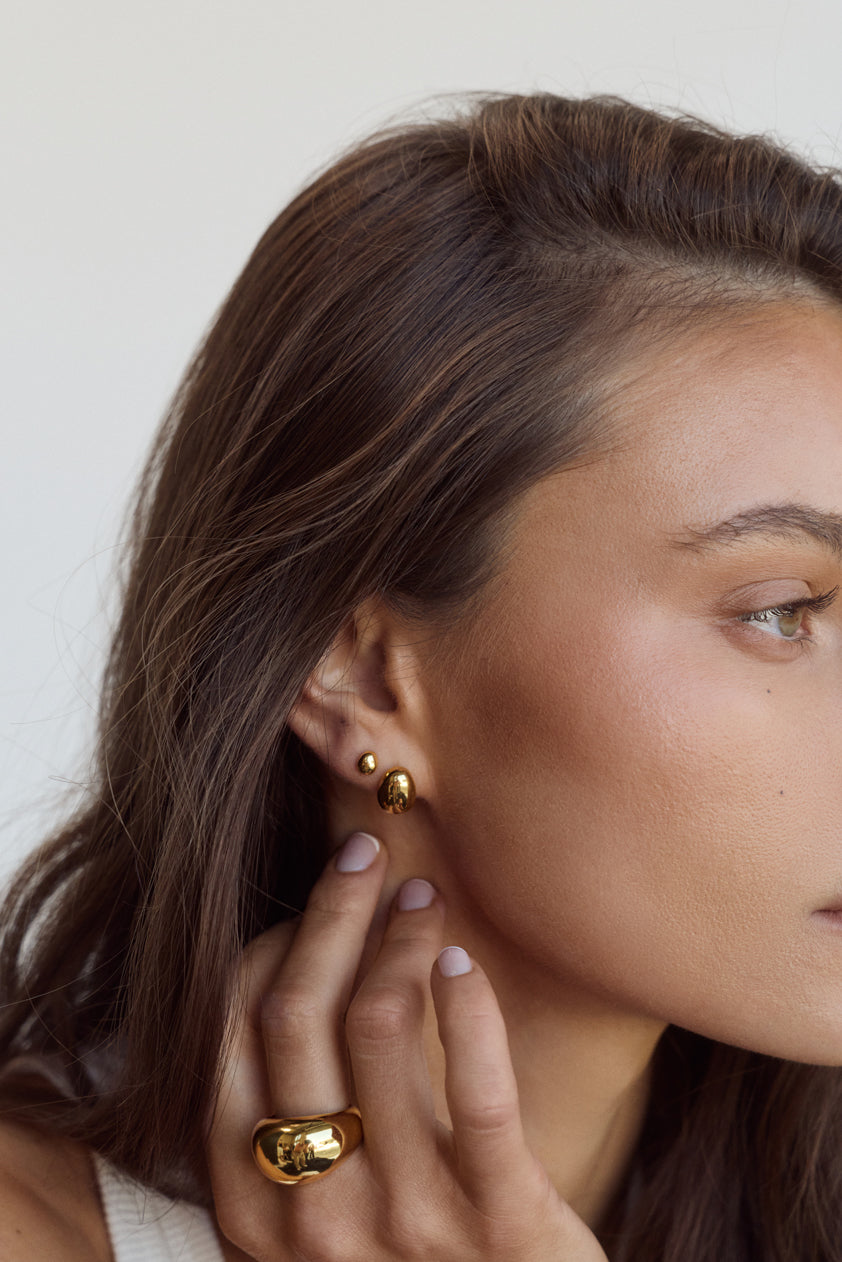 Cendré Bean 18K gold-plated earrings studio shot