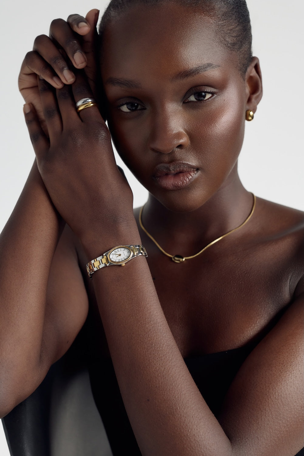 Cendré Daphne 18K gold-plated pendant necklace worn on a model