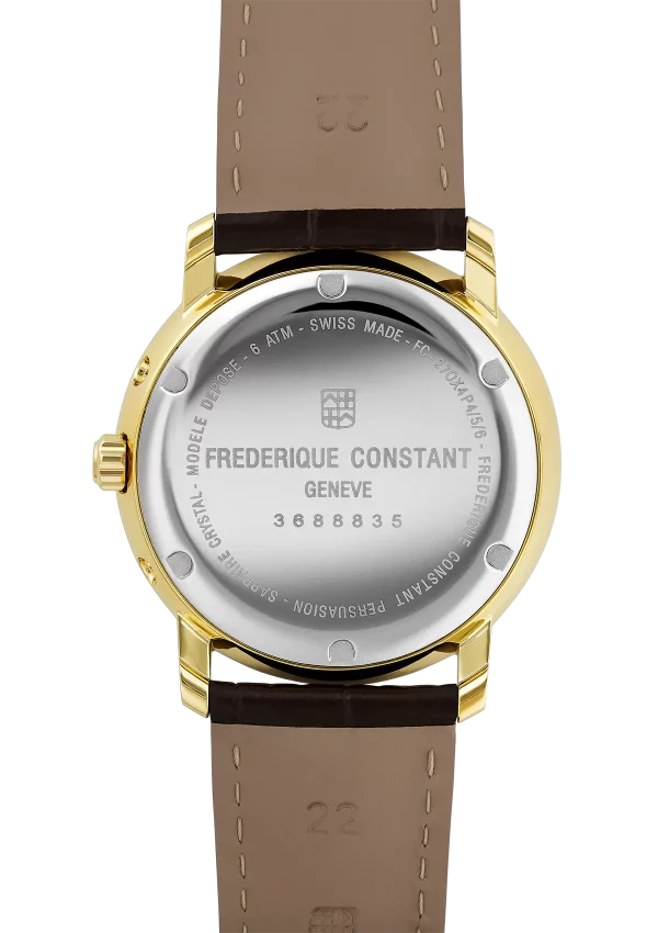 Gold-toned wristwatch with a brown leather strap and visible caseback displaying the brand name Frederique Constant.