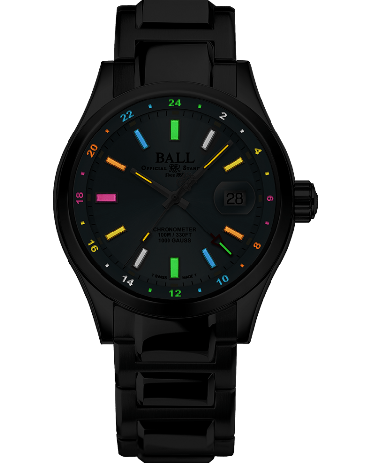 Black wristwatch with colorful hour markers on its dark dial.