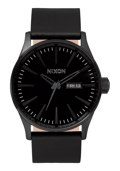 Black wristwatch with a minimalist design and leather strap.
