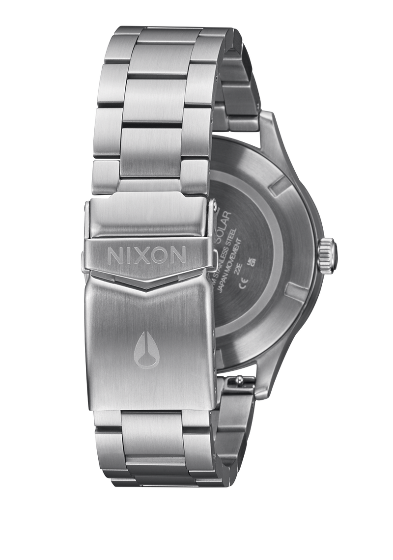 Stainless steel wristwatch with a metal bracelet and Nixon branding on the clasp.