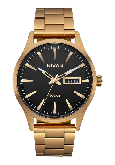 Gold-toned wristwatch with a black dial face and day-date display.