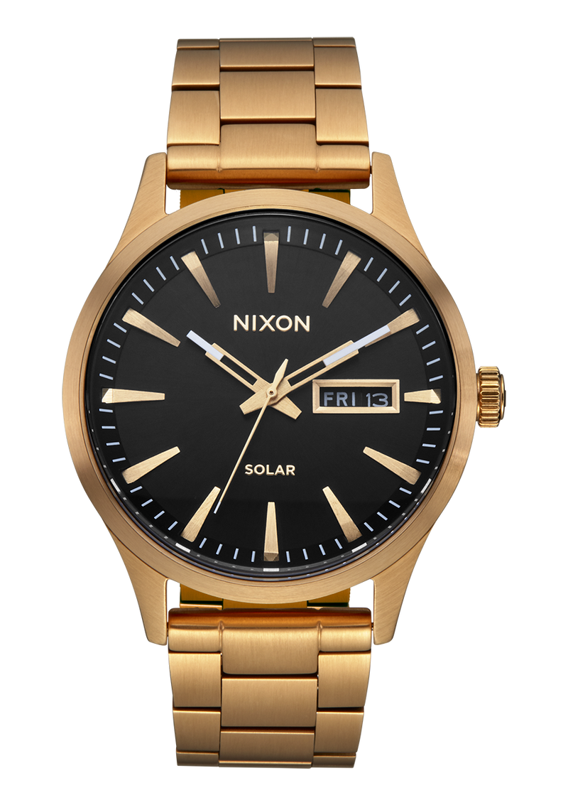 Gold-toned wristwatch with a black dial face and day-date display.