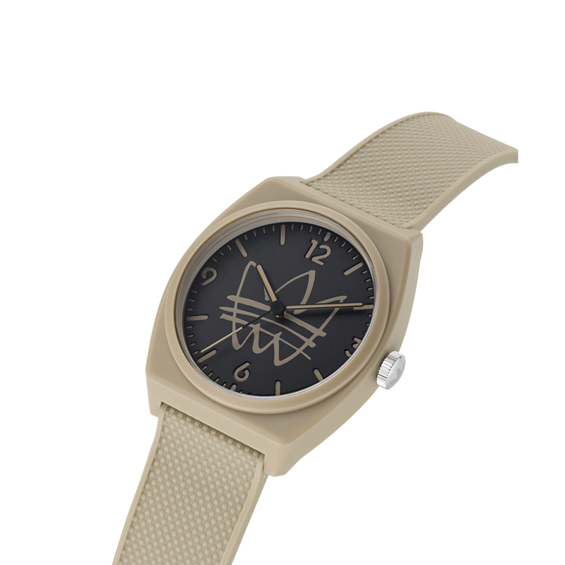 Beige wristwatch with a black dial featuring a stylized logo design.