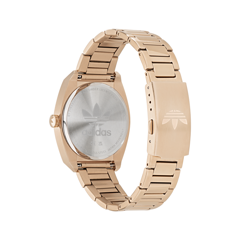 Rose gold wristwatch with a metal link band.