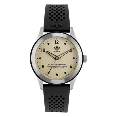 Adidas wristwatch with a cream-colored dial and black perforated strap.