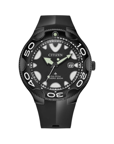 Black Citizen dive watch with a rubber strap and rotating bezel.