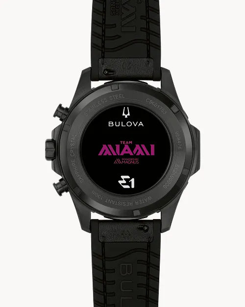 Bulova Marine Star E1 Team Miami 98B476 chronograph men's watch with magenta ombre purple dial and black rubber strap — caseback view