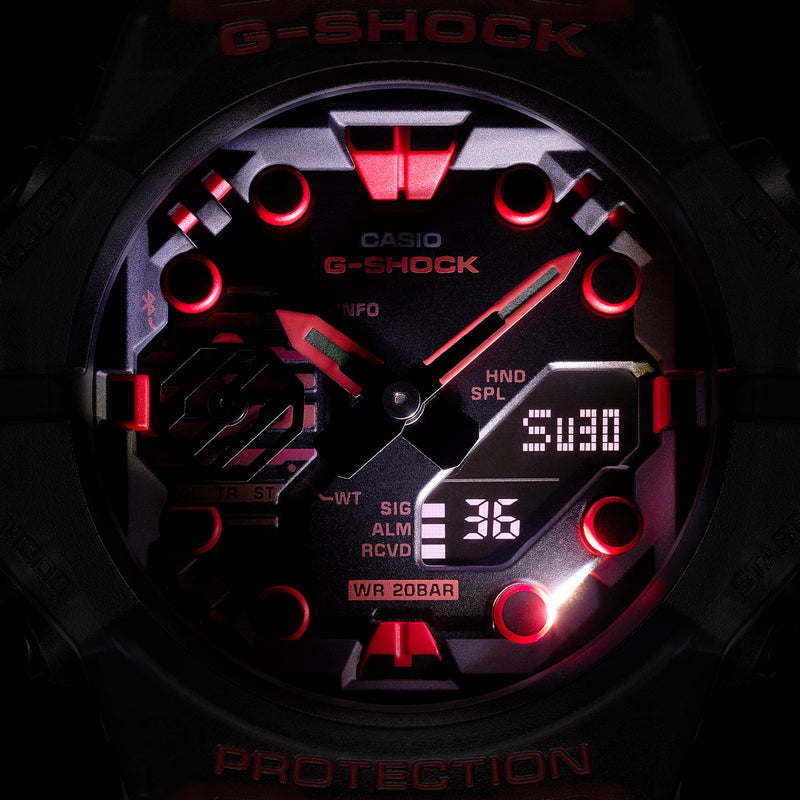 G-Shock watch face with red and black digital display showing time and other information.