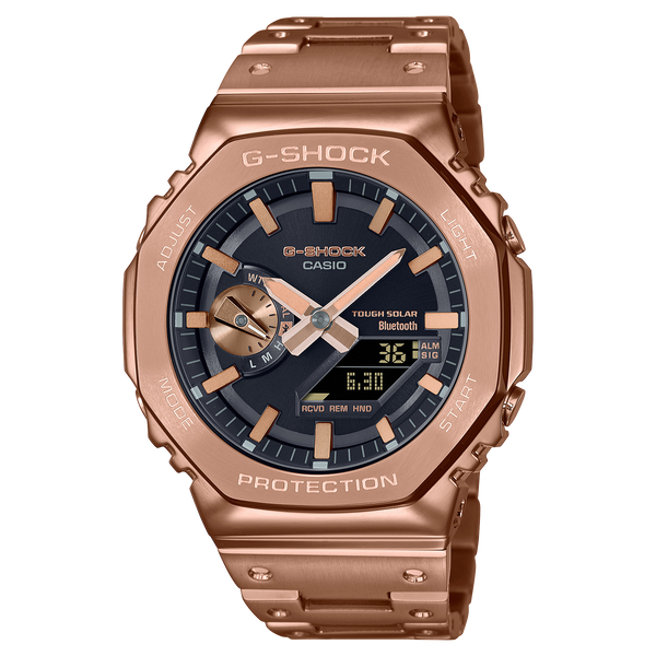 Rose gold G-Shock watch with a black dial and digital-analog display.