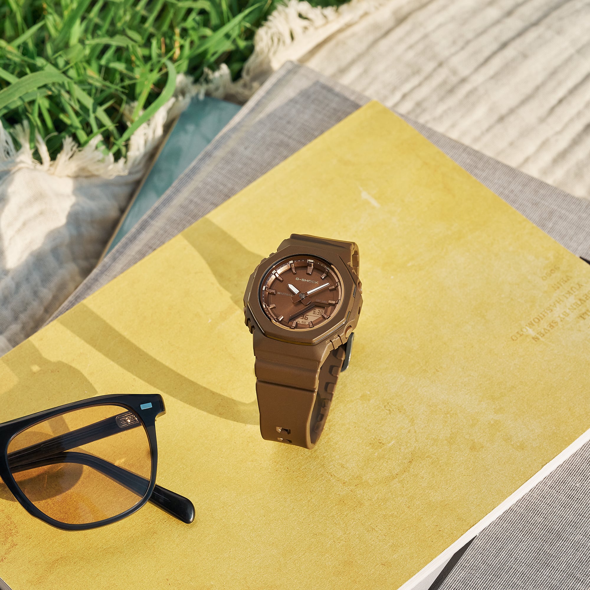 G-Shock GMAP2110B-5A brown resin watch shown at an angle