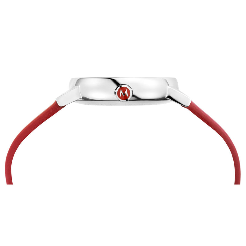 Wristwatch with a white face and red strap viewed from the side.