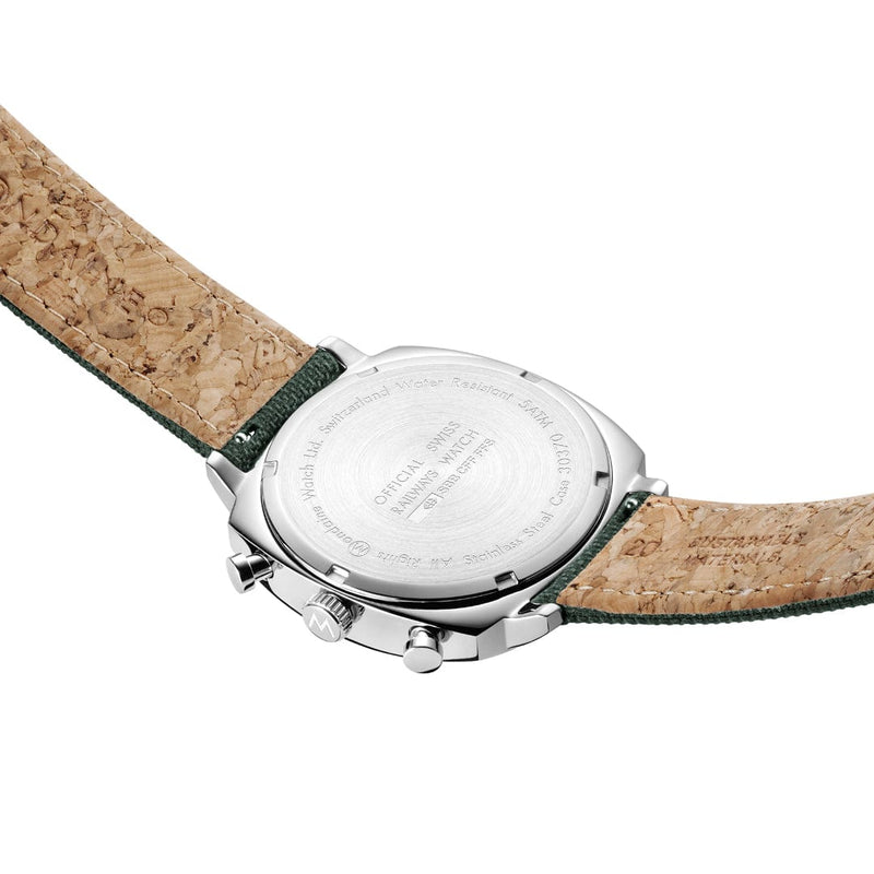 Wristwatch with a cork-textured leather strap and silver case back.