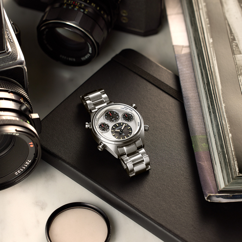 Stainless steel chronograph wristwatch with a triple subdial face.