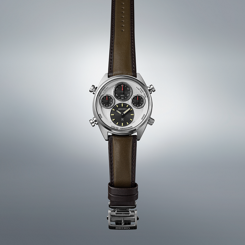 Wristwatch with multiple dials and a brown leather strap.