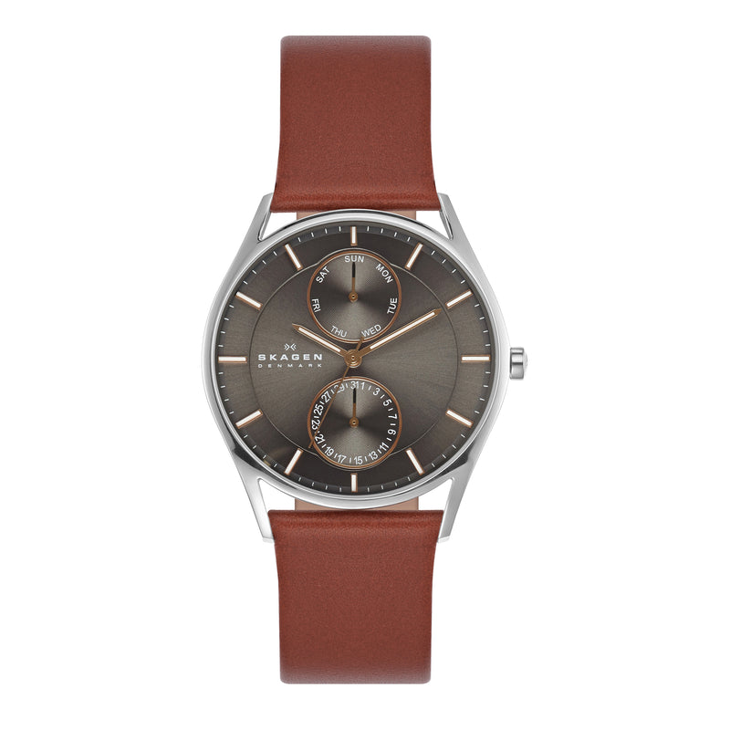 Wristwatch with a brown leather strap and gray dial face.