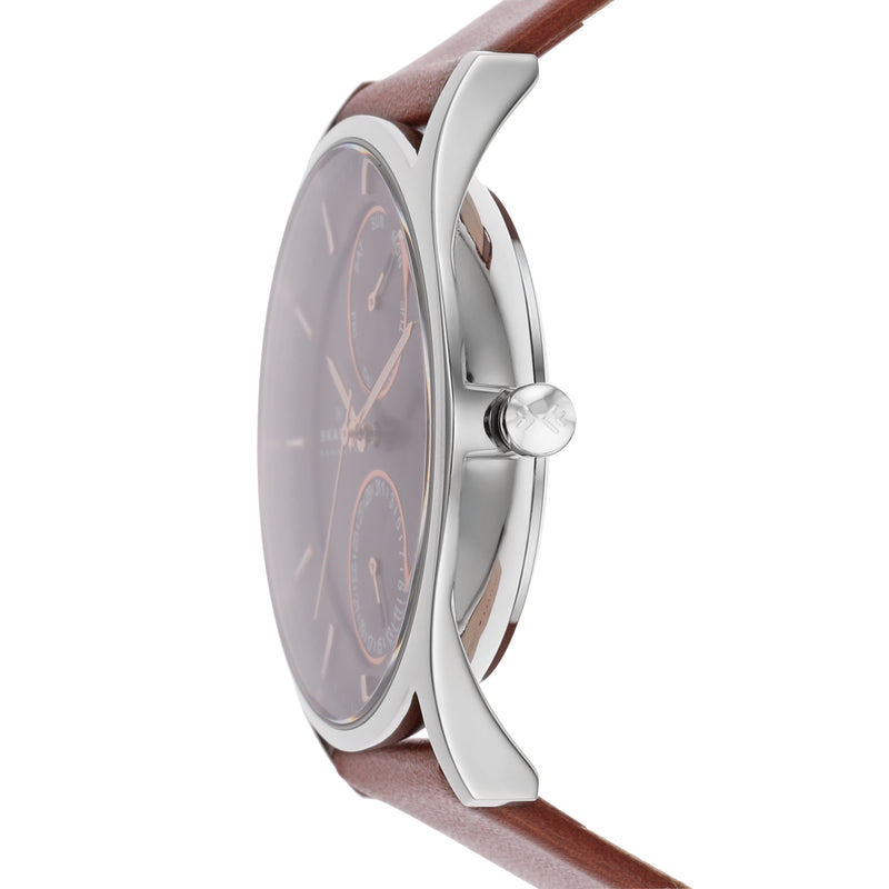 Wristwatch with a silver case, brown leather strap, and burgundy-colored dial.