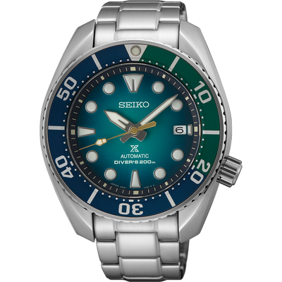 Seiko Prospex diver’s watch with a blue and green bezel and teal dial.