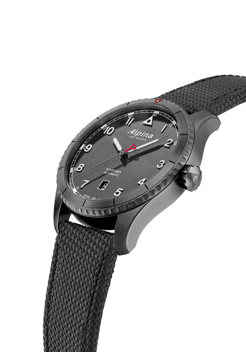 Sleek wristwatch with a dark gray case, black dial, and textured fabric strap.