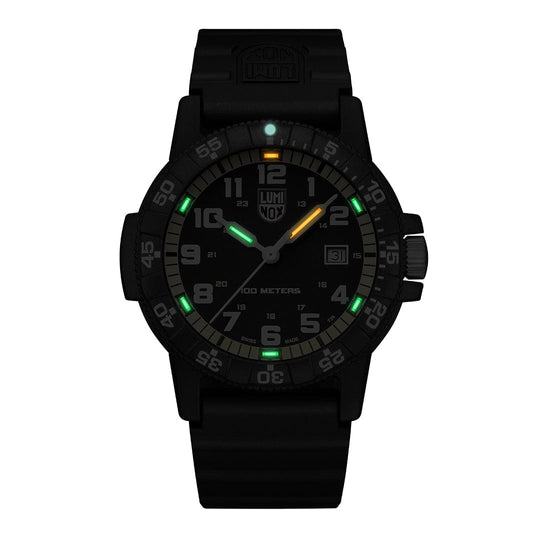 Black tactical wristwatch with luminous markings on the dial and bezel.