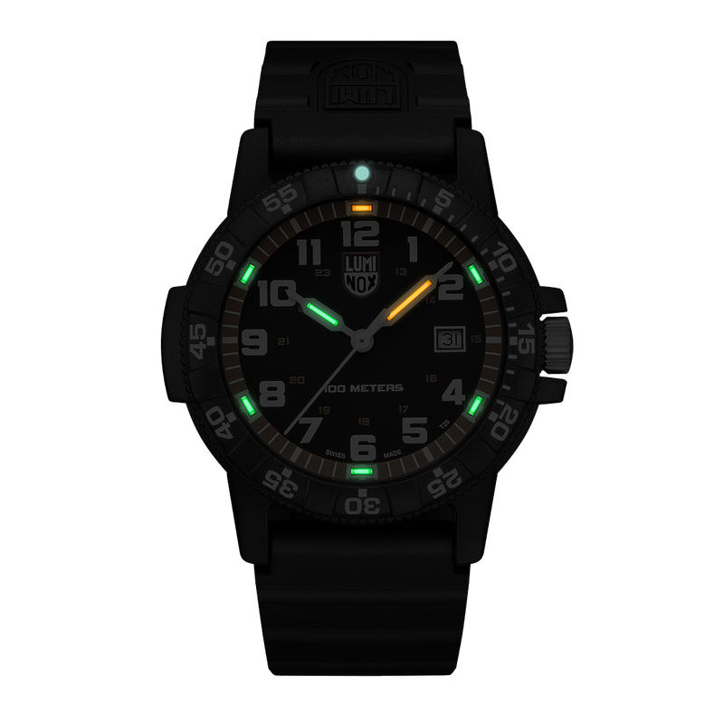 Black tactical wristwatch with luminous markings on the dial and bezel.