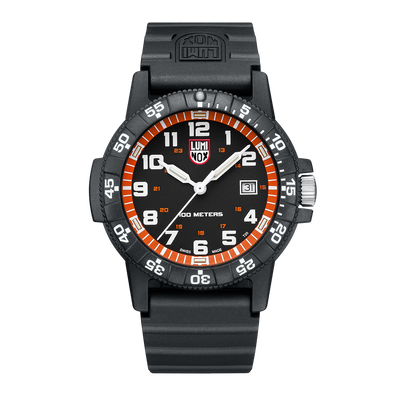 Black sports watch with orange and white markings on the face and bezel.