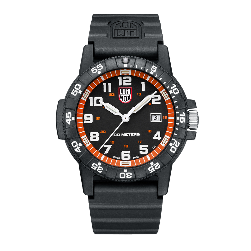 Black sports watch with orange and white markings on the face and bezel.