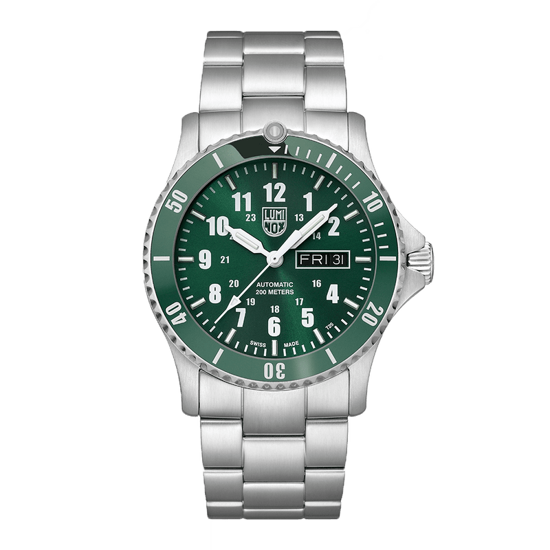 Silver wristwatch with a green dial and rotating bezel.