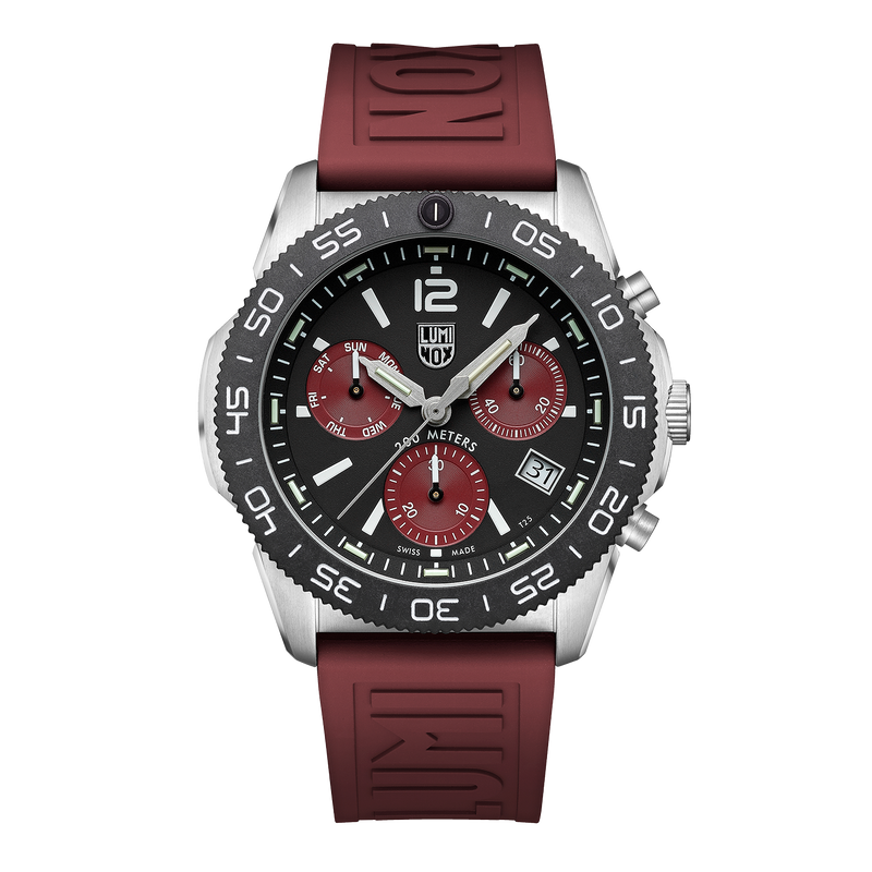 Stylish wristwatch with a black dial, red subdials, and a burgundy rubber strap.