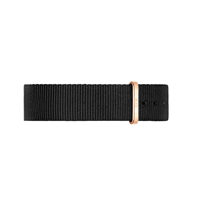 Black fabric watch strap with a rose gold-colored buckle.