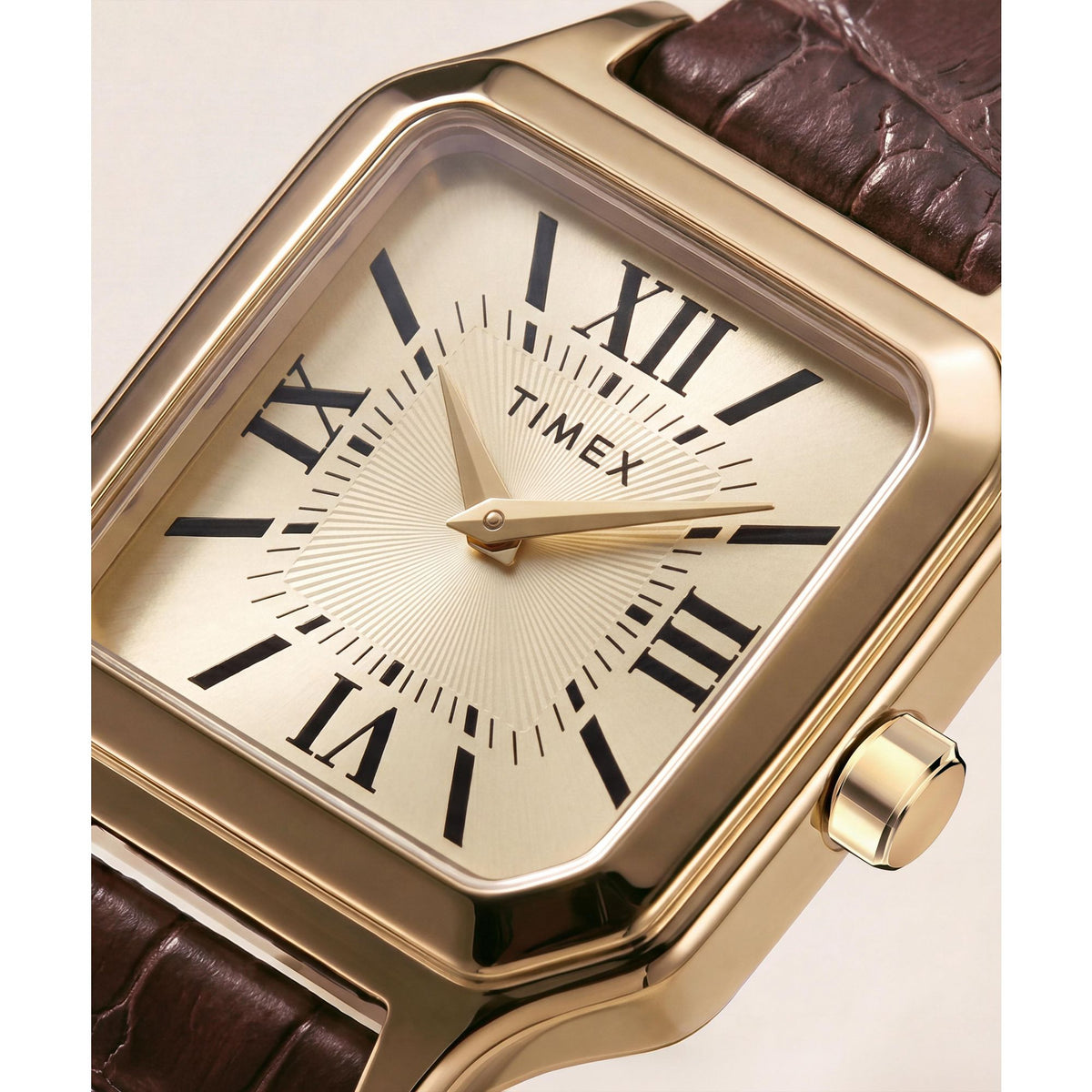 Timex Addison TW2Y90700 champagne dial with Roman numerals on a brown leather strap, dial close-up