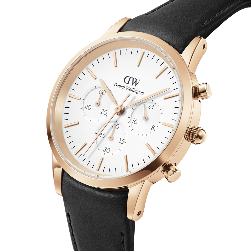 Elegant wristwatch with a white face, gold-tone case, and black leather strap.